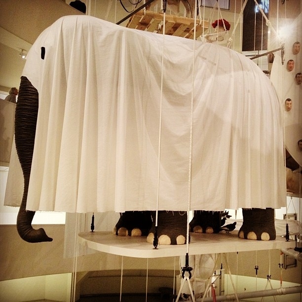 Maurizio Cattelan is best known for his cheeky, hyperrealistic sculptures. For his retrospective at the Guggenheim, he decided to take an equally cheeky approach to the way the art was presented: dozens of sculptures were hung from the ceiling like an oversized art mobile.