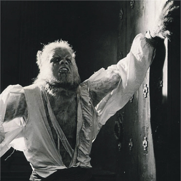 Wolfman! (Oliver Reed) There is no howling at the moon with a buttoned up shirt!