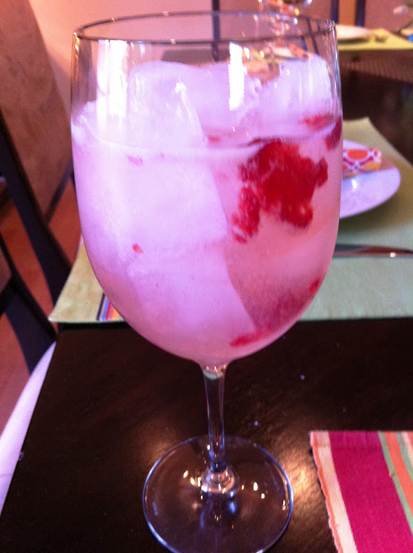 Ingredients:2 bottles Moscato1 pink lemonade concentrate3 cups of Sprite (more or less, depending on your taste)Fresh raspberries