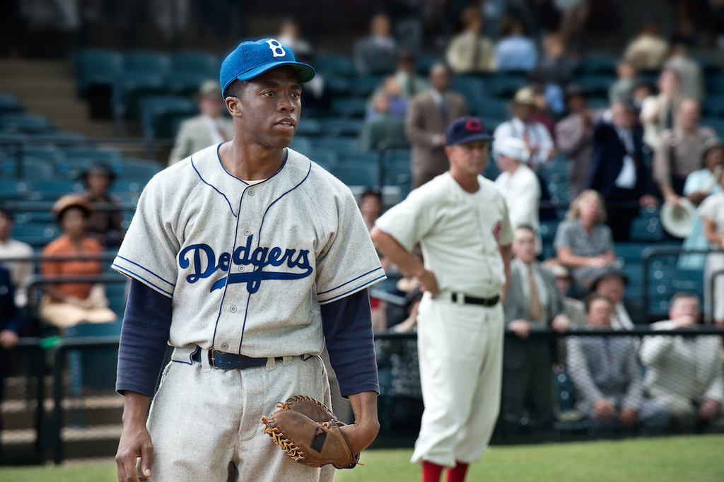 Chadwick Boseman as Jackie Robinson in 42