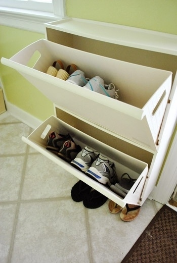Use recycling bins from Ikea to store shoes in an entryway.