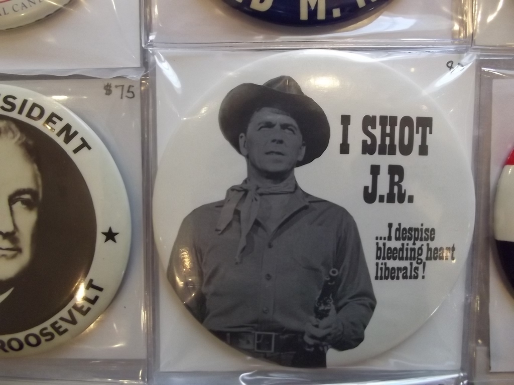 The Ronald Reagan button pins him for the attempted murder/classic cliffhanger on Dallas.