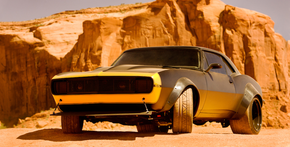 It's a custom 1967 Camaro, almost all black, which suggests a far less cutesy version than the one that followed Shia LaBeouf around like an enormous metal puppy.