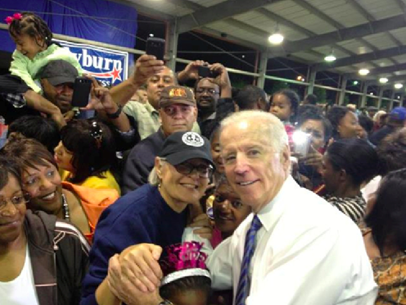 Elaine Cooper, a member of the Sierra Club's South Carolina chapter, poses with Vice President Joe Biden at a fish fry hosted by Rep. Clyburn in Columbia.