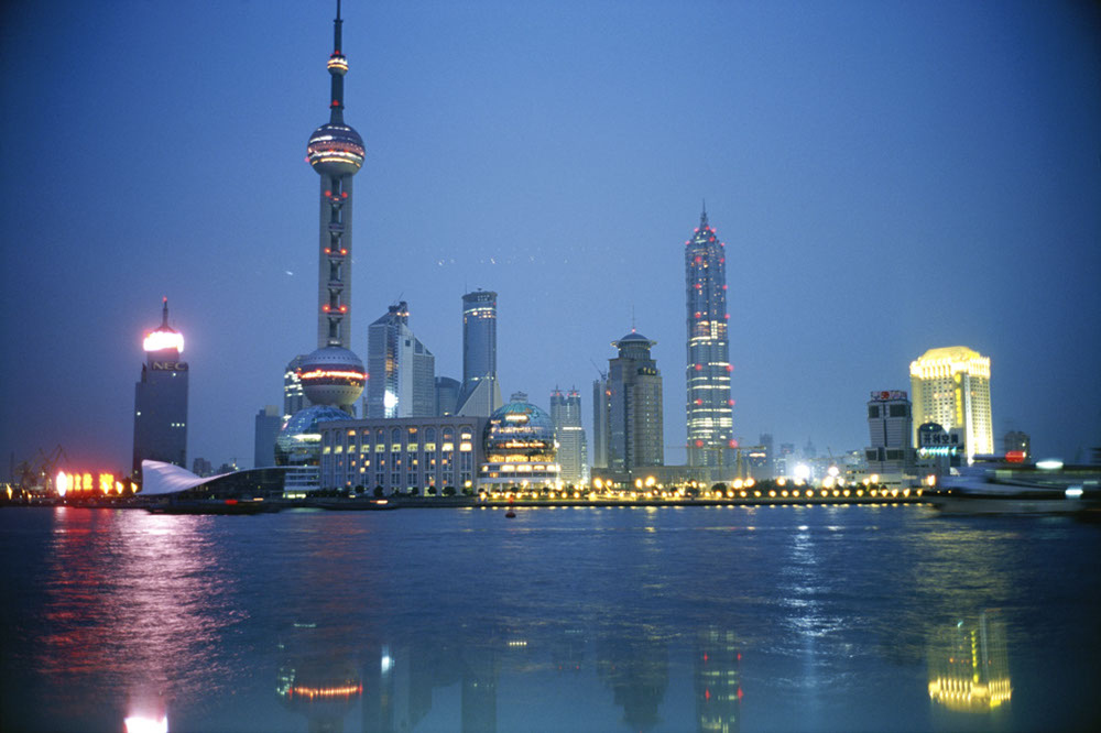 Shanghai, ChinaSince 1990, Shanghai has built over one thousand high-rises, with 165 still in planning or construction phases. The skyline boasts the feel of a futuristic cityscape with the Oriental Pearl Tower (the one with two orbs on the left), the Jin Mao Tower (center), and the World Financial Center (not pictured).