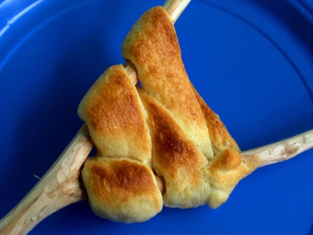 Make crescent rolls over the campfire.