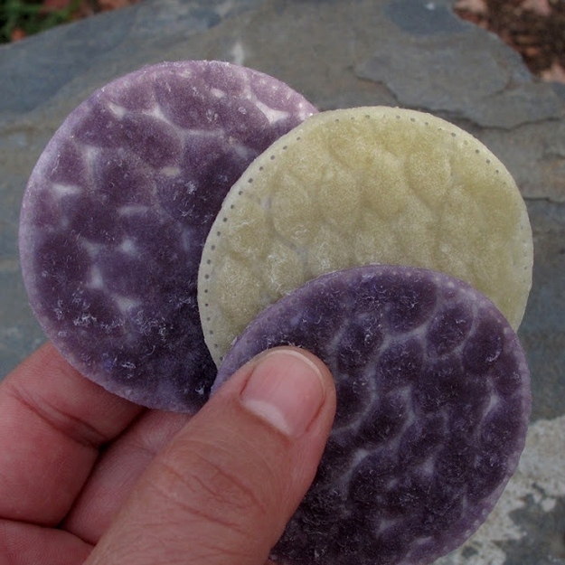 Cotton pads dipped in wax are a crazy easy way to make portable fire starters.