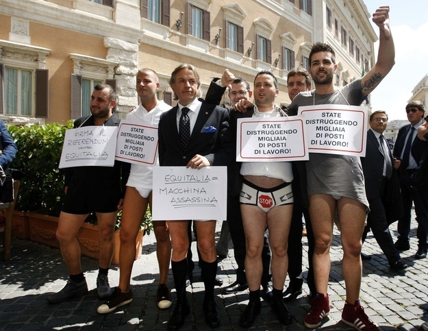 Half Naked Protesters Fight Tax Collectors In Italy