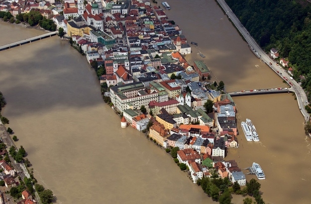 The swollen Danube river (right) and the Inn river (left) in Passau on June 6.