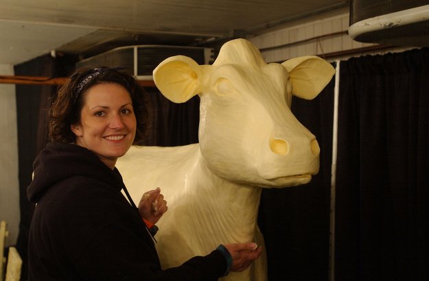 Sculptor Sarah Pratt with the butter cow.
