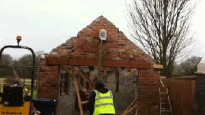 He wasn't suppose to bring down the wall just to the alarm box.