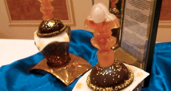This dessert comes in a hand blown sugar vase and it's made from a bunch of fancy stuff including Venezuelan dark chocolate, gold vanilla caviar, and Remy Martin cognac. Suri Cruise probably gets these flown in on her birthday.