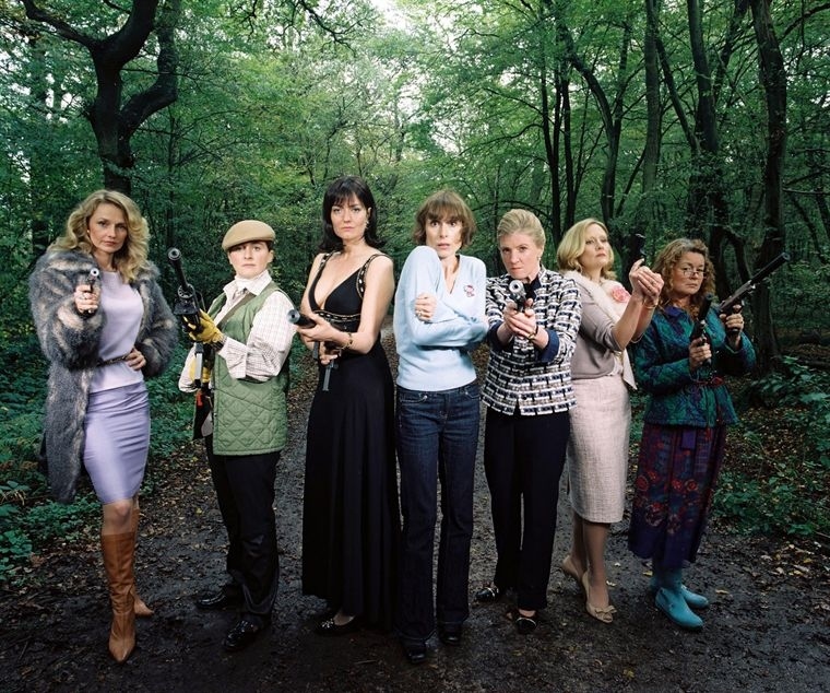 Well, here's a brief synopsis:Joyce Hazeldine and her husband, Jeremy, pack their bags and move, from London, to what seems to be a peaceful town called Little Stempington. She soon discovers, however, there are two rival gangs of housewives: one headed by Camilla Diamond and the other by Barbara Du Prez.Once very good friends, Camilla and Barbara originally turned to weaponry and intimidation as a way of dealing with crime and antisocial behavior, gathering a small group of local women to help further their cause. Unfortunately, the group divided into two smaller gangs when Camilla grew greedy and used their increased clout for her own personal gain.Barbara's gang continues to take extreme action against perceived "threats to Little Stempington life" - planned low-cost housing, teenagers wearing hoodies, etc., while also working tirelessly against Camilla's gang. Timid Joyce, unfortunately, becomes a pawn in both gangs, enlisted by Barbara to work undercover as a way of getting closer to Camilla.But enough about the ladies! Let's get to Hiddles!