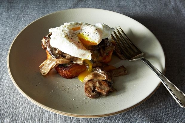 Toast is the ideal absorptive foundation for juicy sauteed mushrooms and eggs. Get the full recipe at Food52.