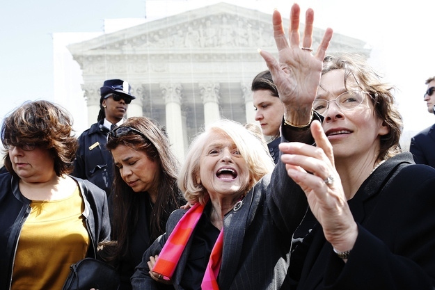 Plaintiff Edith Windsor greets the crowd outside the Supreme Court after arguments in her case against the Defense of Marriage Act on March 27, 2013.