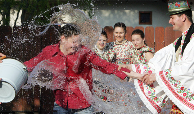 Boys playfully sprinkle perfume or perfumed water on girls. Young men used to pour buckets of water over young women's heads, but now they spray perfume, cologne or just plain water, and ask for a kiss.