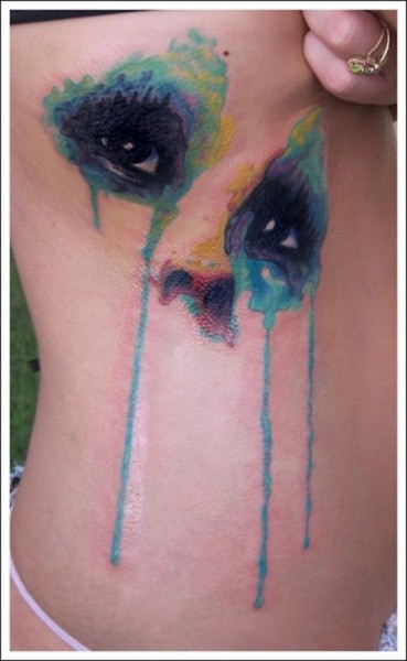 39 People With Watercolor Paintings Tattooed To Their Bodies