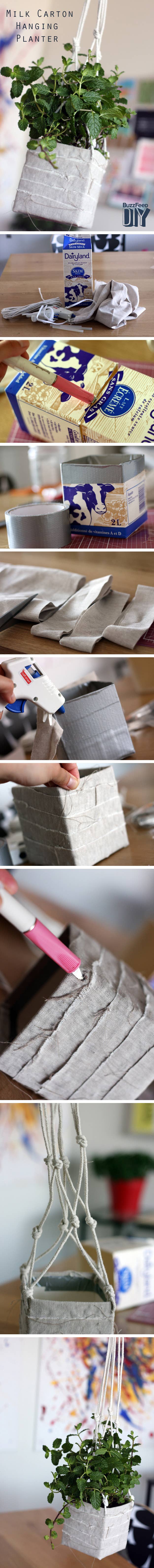 Yes, you can turn a milk carton into chic decor, like Sheryl at Oh So Very Pretty did.Collect the materials: an empty 1L milk or juice carton, duct tape, scraps of linen or canvas fabric, hot glue gun and hot glue, heavy strong string, and your favorite herb plant.