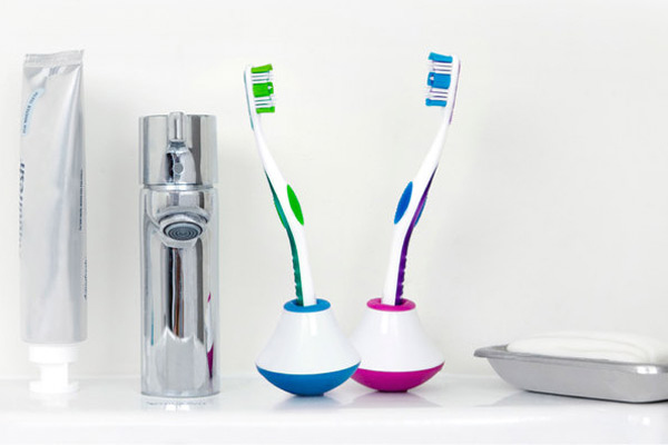 If you've ever pulled a Seinfeld and knocked your honey's toothbrush in the toilet, this little invention is made just for you. A rubberized, weighted base keeps the brush perpetually upright, saving you the horror of having to fish an errant tooth cleaner out of the bowl.