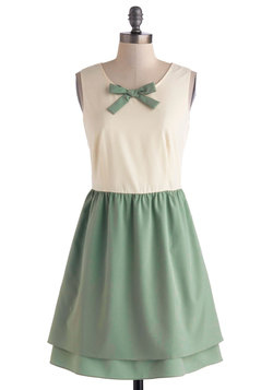 The Fine Mint Dress - The mint color is precious, along with the two layered skirt. The little bow detail makes the perfect accessory.