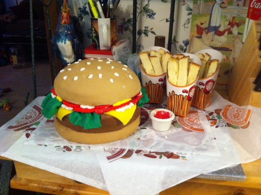 With three servings of fries...which are actually cake, obviously.