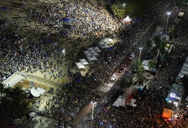Earlier in the day, the Pope was in the shanties of Rio to spread a message of solidarity with the poor.