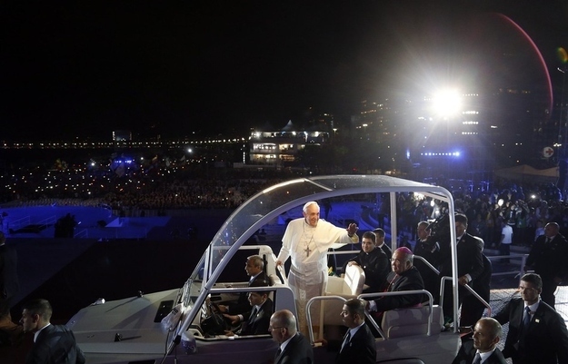 Pope Francis arrives to celebrate at Copacabana beach.