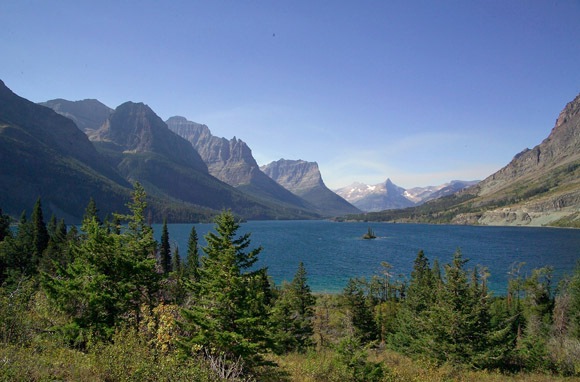 Explore the mountains for days on end without schlepping around heavy gear. No need for burdensome tents and sleeping bags because after the day's hike, there's a welcoming roof, a well-deserved meal, and a cozy bed at the end of the trail.For hut-to-hut hiking at Glacier National Park, lodge at Granite Park Chalet near Swiftcurrent Pass and Sperry Chalet near Lake McDonald—the latter built in the early 20th century and now listed as a National Historic Landmark. Bed-only rates start at $94 at Granite Park Chalet and $195 for accommodations plus three meals at Sperry Chalet. Local outfitter Glacier Guides offers popular multi-day hut-to-hut guided backpacking trips as well.