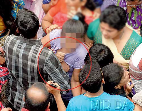 Shocking Photographs Of Three Perverts Molesting A Woman During A Religious Festival In Mumbai