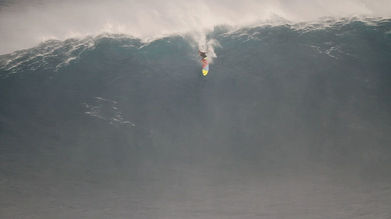 Surfer Jeff Rowley conquered waves higher than 50 feet in Maui, Hawaii - and he was brave enough to paddle it in. Meaning, he didn't use a jet ski tow-in. Because GET OUT OF HERE, this is man v. nature. Not man and machine v. nature.