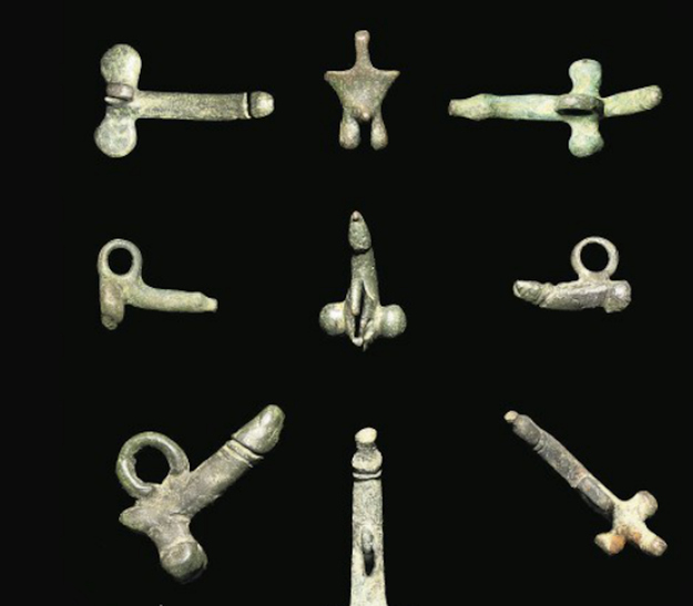Phalluses were considered good luck charms. They were worn as charms on necklaces or hung in doorways as wind chimes as a way to ward off evil spirits.