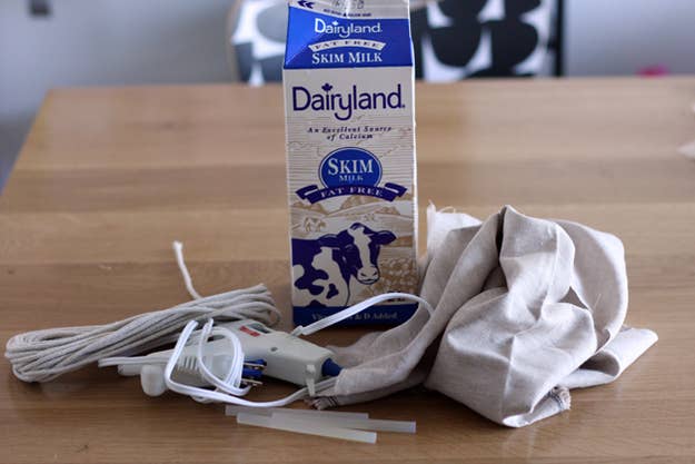 Wash out your empty milk/juice carton and dry it. Measure up 4 inches from the bottom of the carton. Using a permanent marker, make a line all the way around.