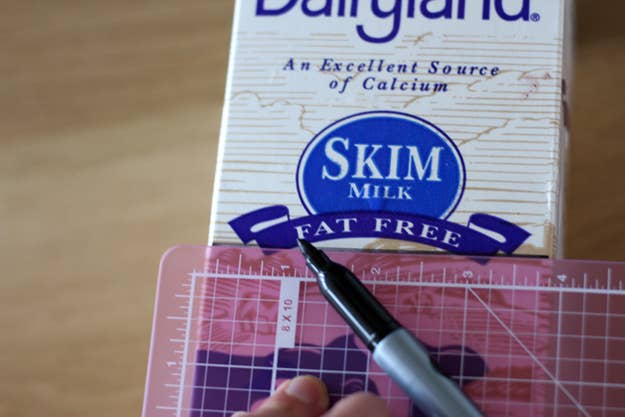 Using an X-Acto knife, cut along the line that you just drew. You'll be left with an open top box.