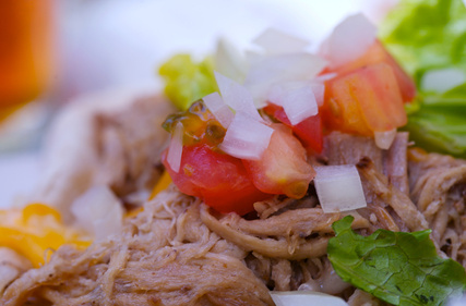 Kalua Pork or Kalua Pig is Hawaii's version of pulled pork cooked in an underground oven or imu, the smokey, succulent pork literally falls of the bones! This is another must-have at any luau and is as authentic as it gets when it comes to true Hawaiian-fare.. Fortunately for you, the recipe doesn't require you to dig a hole in the ground!Get Recipe