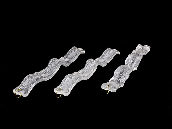 Crystal Bacon is my sculptural tribute to the most delicious of all meats, bacon. With the help of my wife and daughter, it grew into jewelry and Christmas ornaments. While not true crystal, it is made out of a high quality acrylic plastic that is both durable and beautiful. A true ode to bacon!