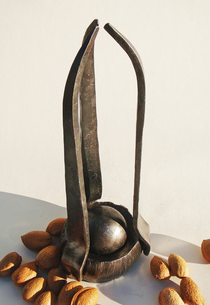 The Nutkraken is a hand forged work of art which also cracks nuts beautifully by dropping a steel ball onto a cupped block of steel.