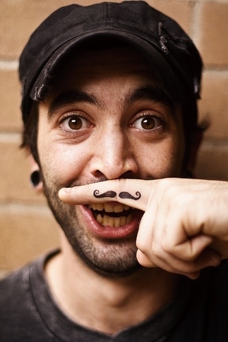 Sure you could grow a mustache (boys), but why not go a step further with a permanent mustache tattoo?! Not only can you take eccentric photos like this, but you always have a reminder of how fun and different you are--forever.