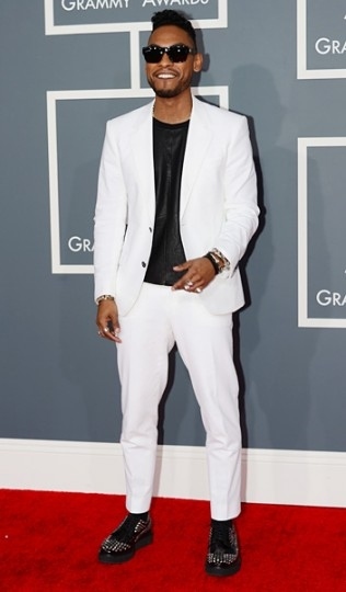 It's a Lanvin suit. And the shoes are eerily familiar, aren't they?