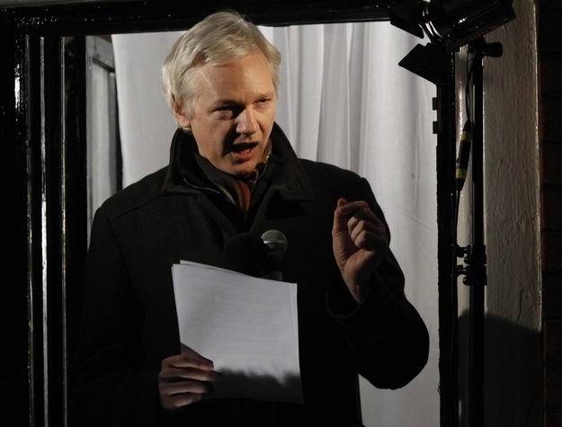 WikiLeaks founder Julian Assange makes a speech from the balcony of Ecuador's Embassy in London in December.