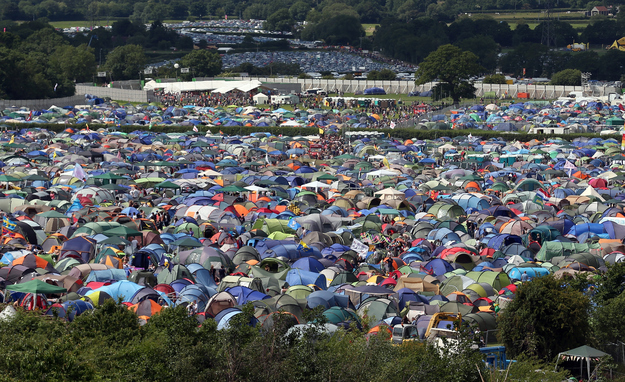 135,000 tickets sold out in 1hr 40mins. The Pyramid stage holds 90,000 people, that leaves 45,000 people having to watch 'The Other Stage'. That equates to 430 tents per hectare, though that's not very interesting.