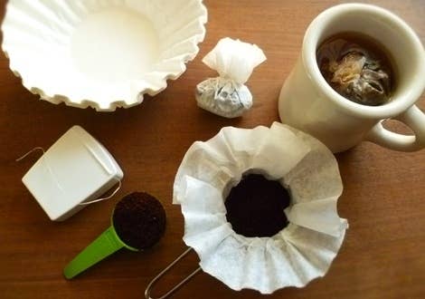 Place a scoop of coffee grounds into a coffee filter and tie it up with dental floss. When you're ready to brew, just make it like you would make tea in a teabag!