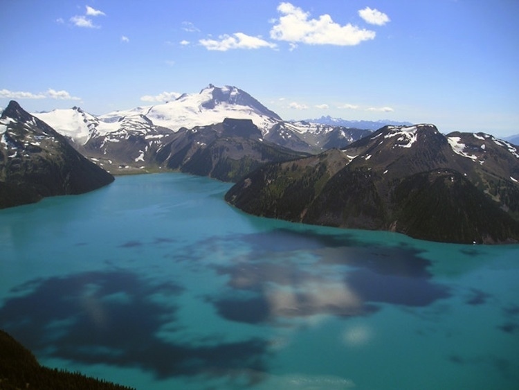 While this hike in British Columbia is a doozy at 17 miles out and back, it’s been called one of the best for those seeking panoramic mountain views and overall wilderness wonderment. Just under 2 hours north of Vancouver, this day hike will take you into a timber forest, through glacial meadows, and across ridge lines until you finally arrive at Panorama Ridge, overlooking the coastal mountain range and turquoise Garibaldi lake.
