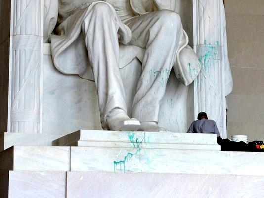 The Lincoln Memorial was the first victim of the green paint splatter, causing it to be closed to the public for 12 hours while workers cleaned off the paint.Despite their best efforts some paint still lingers on the momument.
