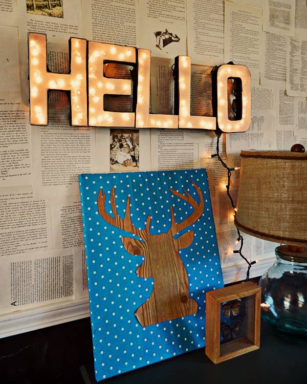 This surprisingly easy sign is made from cardboard letters and electrical tape.