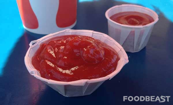 Instead of grabbing multiple cups of ketchup, simply pull apart at the edges for twice the space.