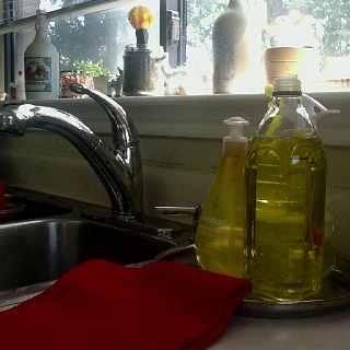 Use an olive oil bottle for your dishwashing liquid.