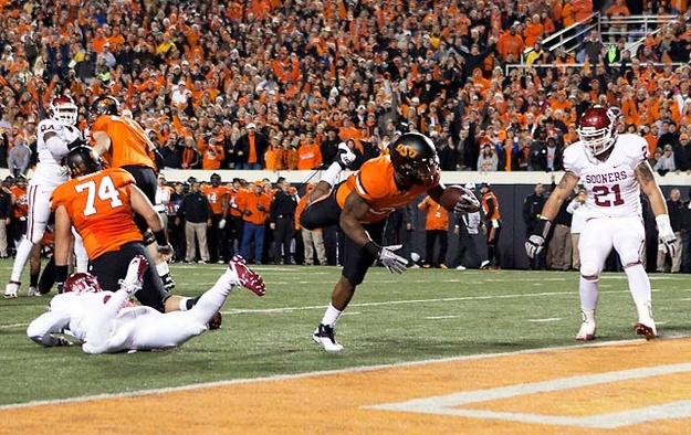 Why: It’s the final significant game of the NCAA regular season and the only match-up of ranked teams. Last season, Oklahoma defeated OK State 51-48 in overtime. With red-shirt freshman Trevor Knight attempting to fill the very large void left by Landry Jones departure, it’ll be interesting to see if the Oklahoma offense can keep up with the Cowboys and light up the scoreboard. It’s also a Saturday in December, so chances are you won’t be leaving your apartment if you don’t have to. Where: TBA on Saturday, December 7th. Game Prediction: 54-48 Oklahoma StateBold Prediction: You’ll be glad you watched Oklahoma State play three times, so when you predict they win their BCS bowl game you’ll look like a hot shot in front of your friends.