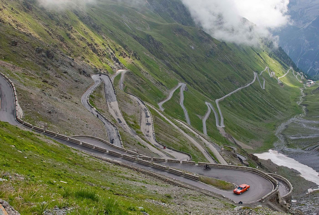The highest paved mountain pass in the Eastern Alps, Stelvio Pass runs for 47 miles through the incredible Italian mountain range. Fun fact: the pass runs right below the "Three languages peak," the virtual meeting point of the Italian, German, and Romanish languages.