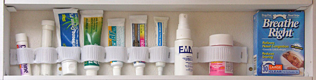 Elastic and staples keep first aid supplies secure.