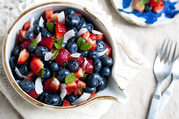 Toss berries with honey, lemon juice, and a little bit of shredded coconut for a simple but interesting fruit salad. Recipe here.